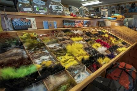 The fly bins at the Frontier Anglers shop in Dillon, Montana